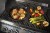 56058-Web-Gallery-04-56058-Large-Cast-Iron-Frying-Pan-InUse.jpg