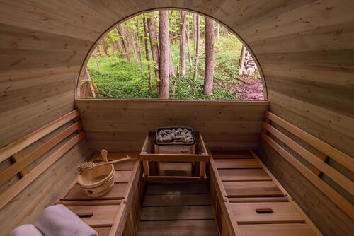 Half-monn-window-red-cedar-knotty-leisurecraft-europe.40911264c000c482c900006a1ec2b12e.jpg